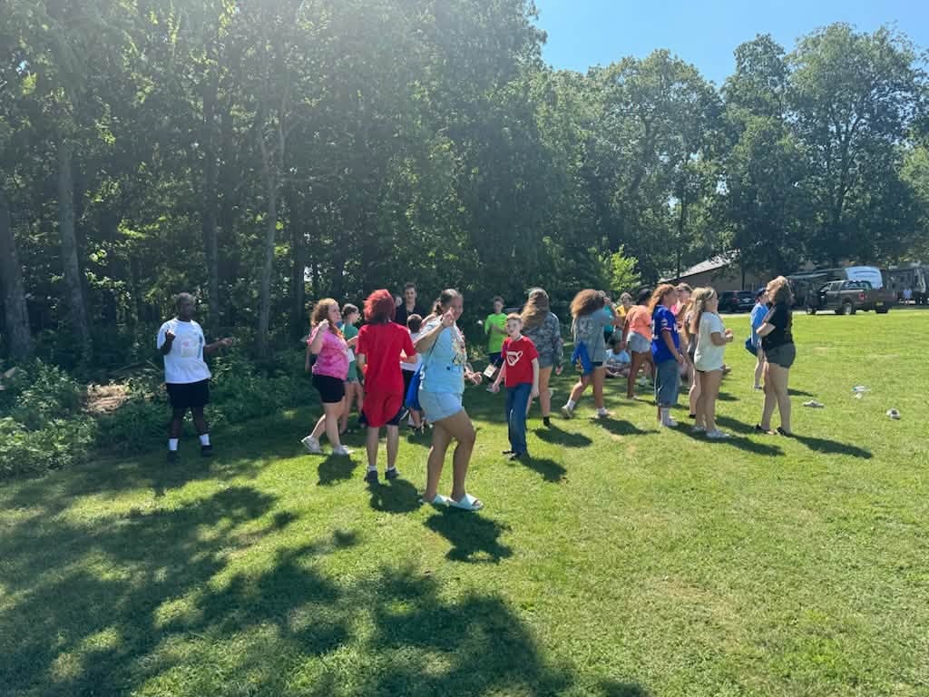 Campers enjoying outdoor group activities